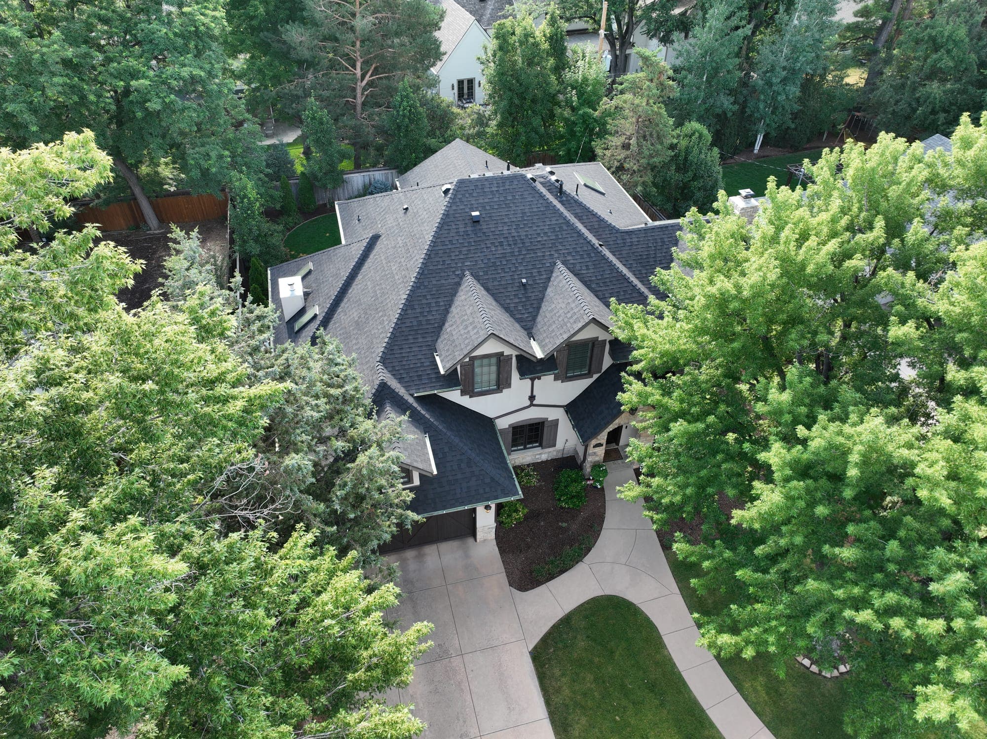 Aerial view of a completed roof in the Hilltop neighborhood