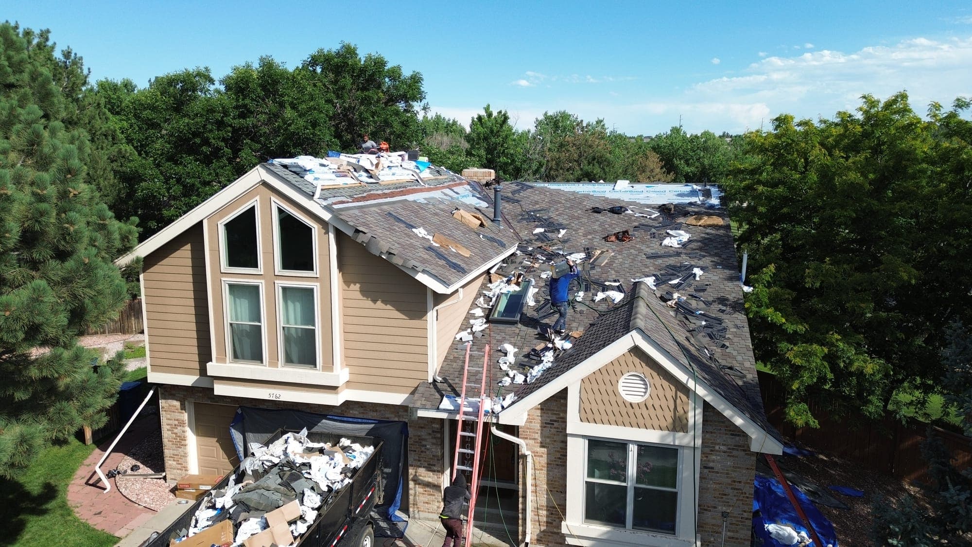 Re-roof in progress on a Colorado home