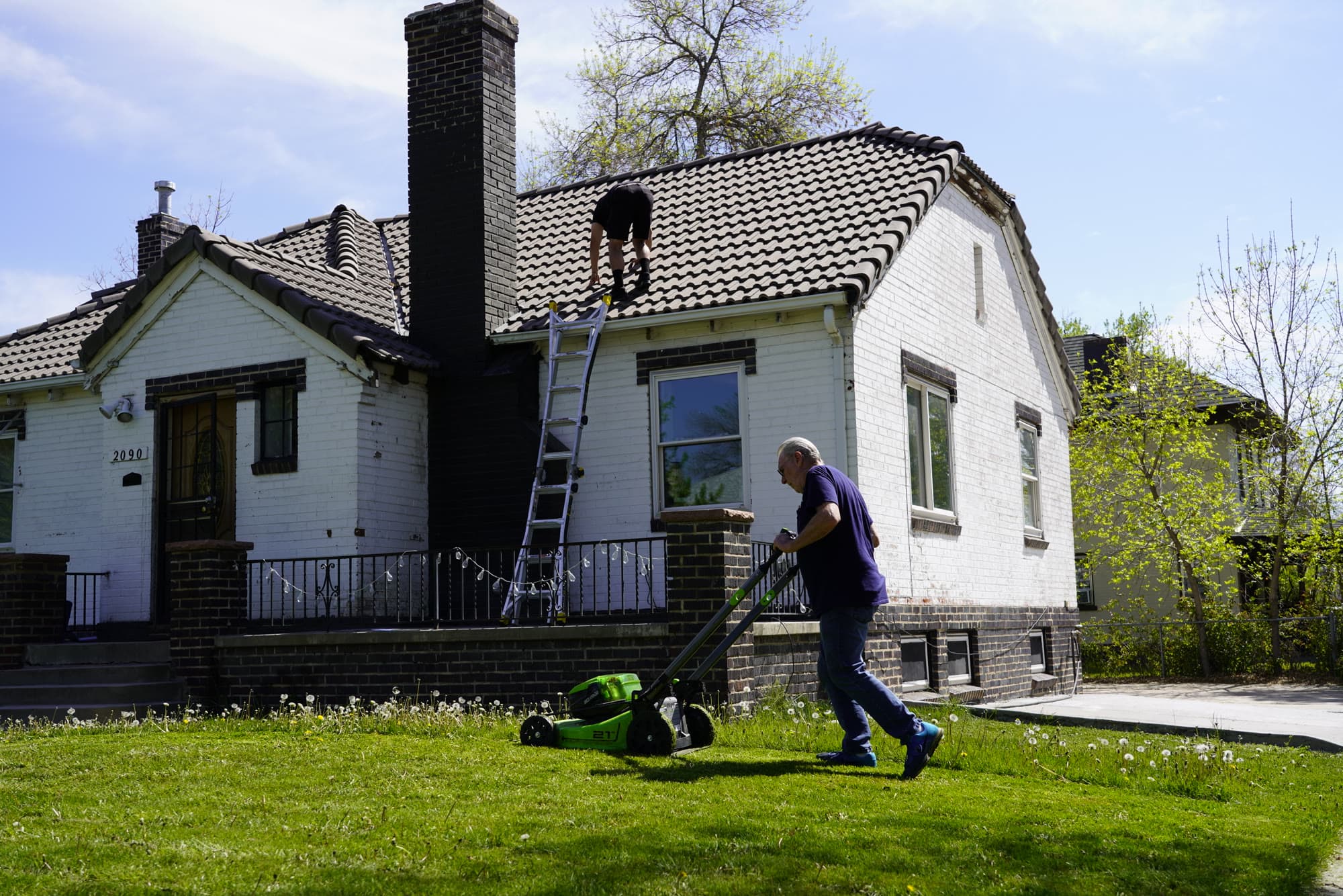 Tile roof work on a stucco home